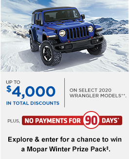 Image of blue Jeep Wrangler in rugged snow-covered landscape