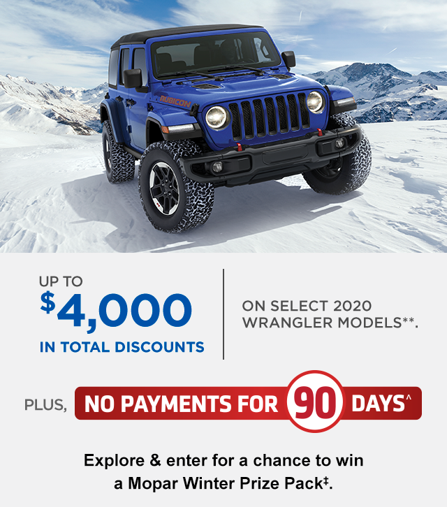 Image of blue Jeep Wrangler in rugged snow-covered landscape